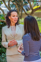 Professor Luz Nagle speaks with a student.
