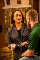 Professor Ciara Torres-Spelliscy counsels a student in the Dolly & Homer Hand Law Library,