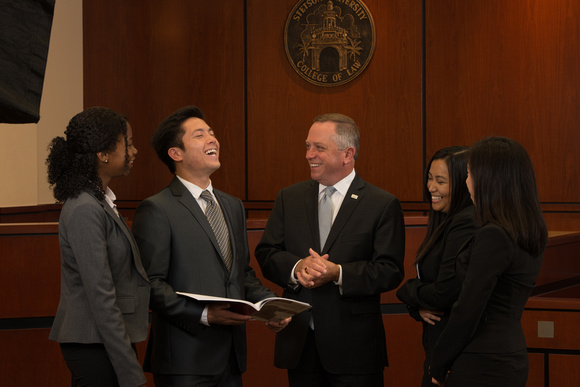 Dean and Professor Christopher Pietruszkiewicz speaks with students in the Eleazer Courtroom, 3.