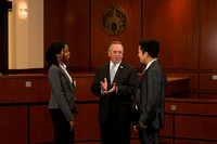 Dean and Professor Christopher Pietruszkiewicz speaks with students in the Eleazer Courtroom.