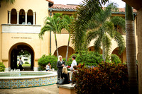 Crummer Classroom building exterior features a fountain and gathering spot.